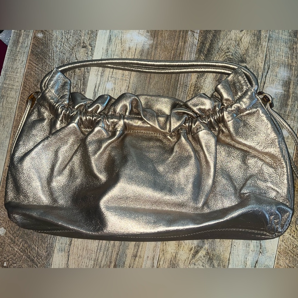 Cole Haan metallic gold purse